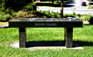 Black beck with the phrase Beloved Teachers engraved on the side. 